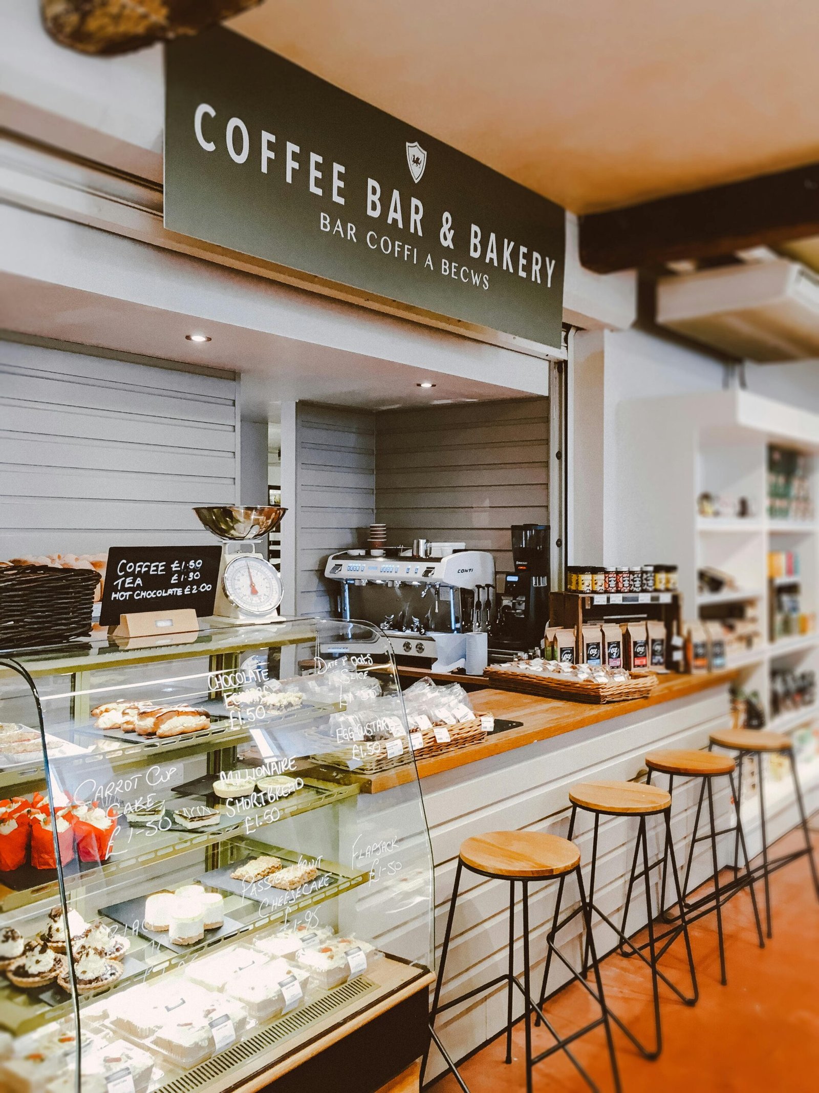 Inviting indoor scene of a bakery cafe with pastries and seating.